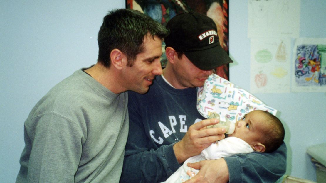 Danny Stewart and Pete Mercurio with their son, Kevin, in 2000.