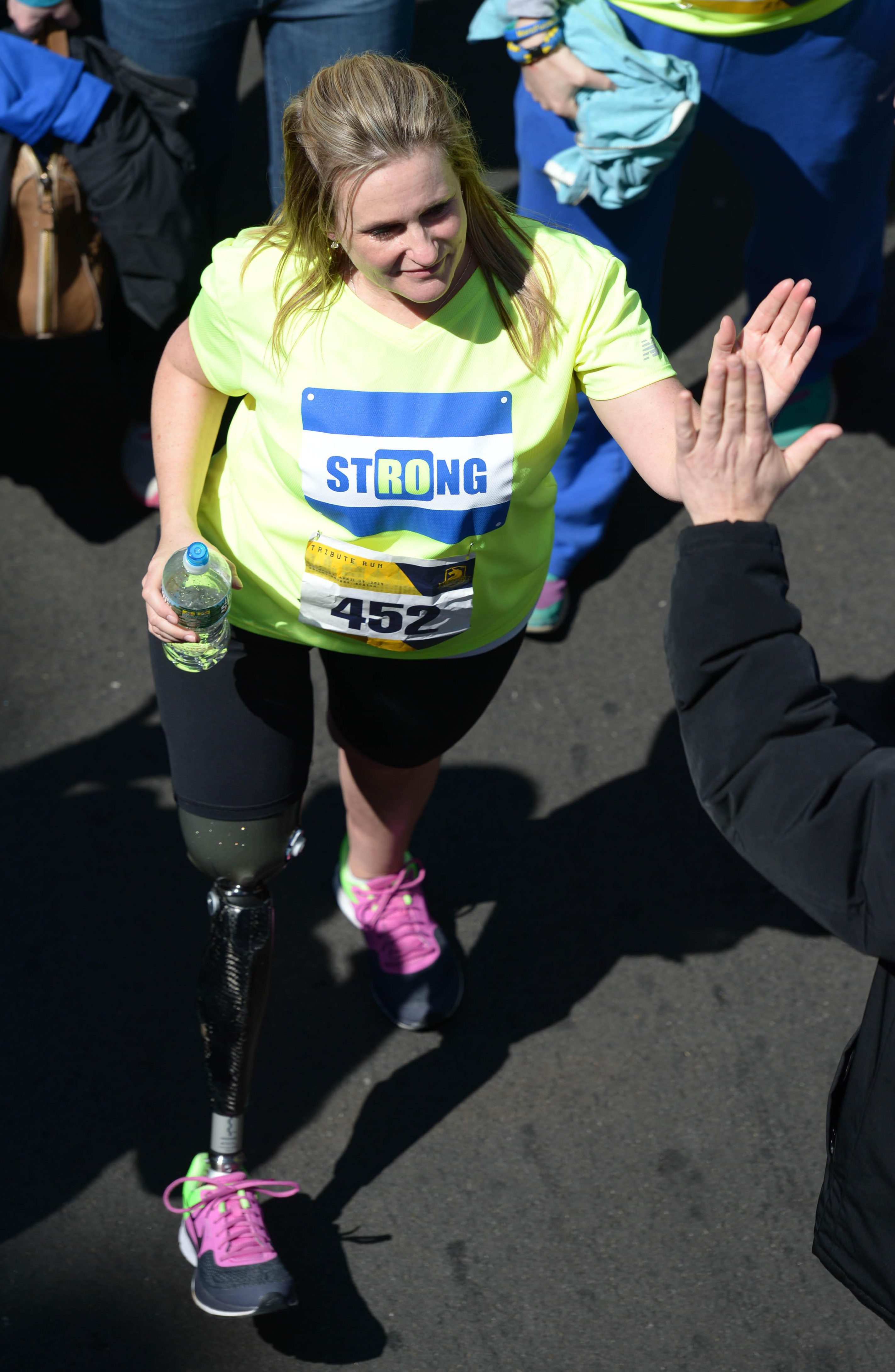  Roseann walks down Boylston Street to the marathon finish line during a Tribute Run in Boston in April 2014