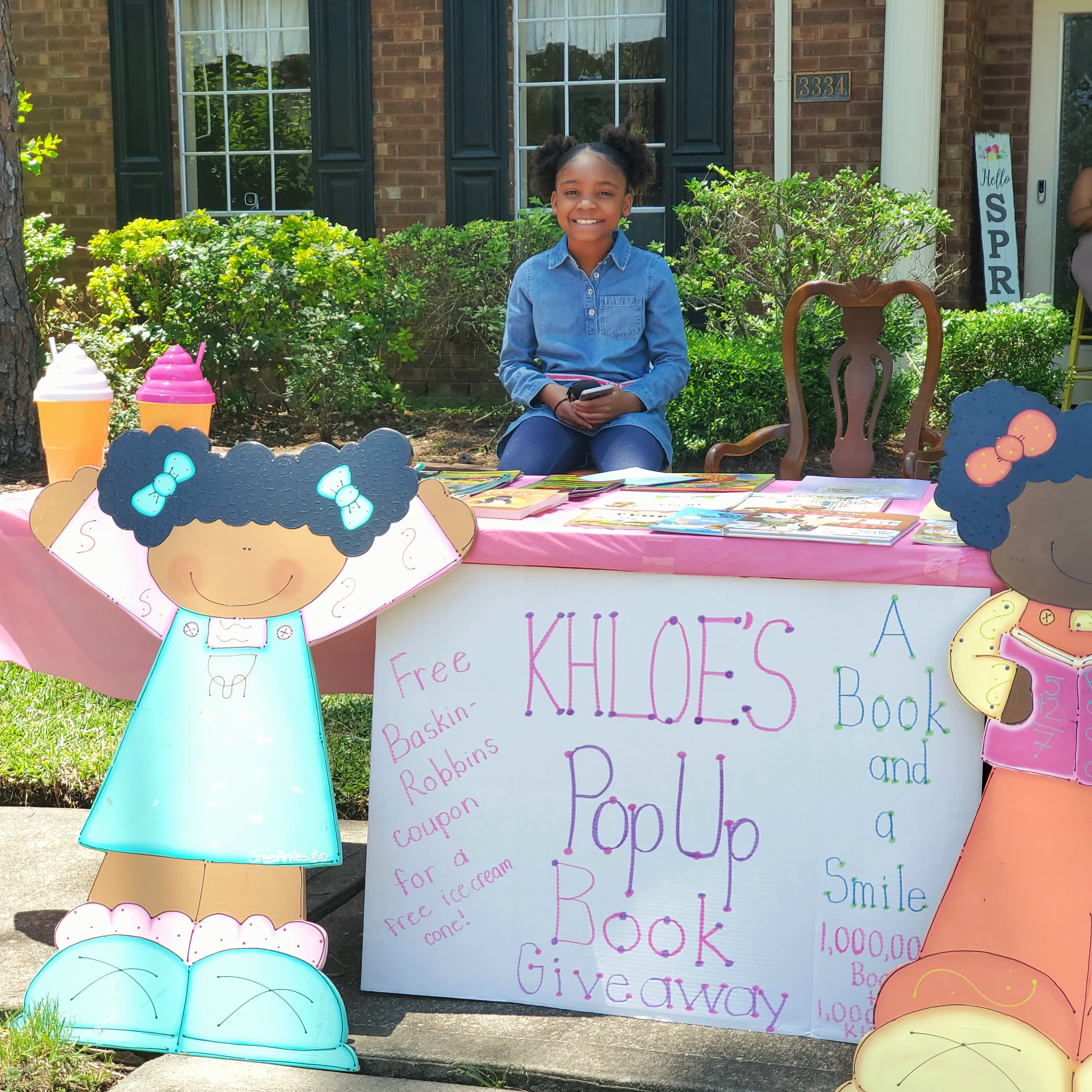 Khloe Joiner's A Book and A Smile aims to give away a million books.