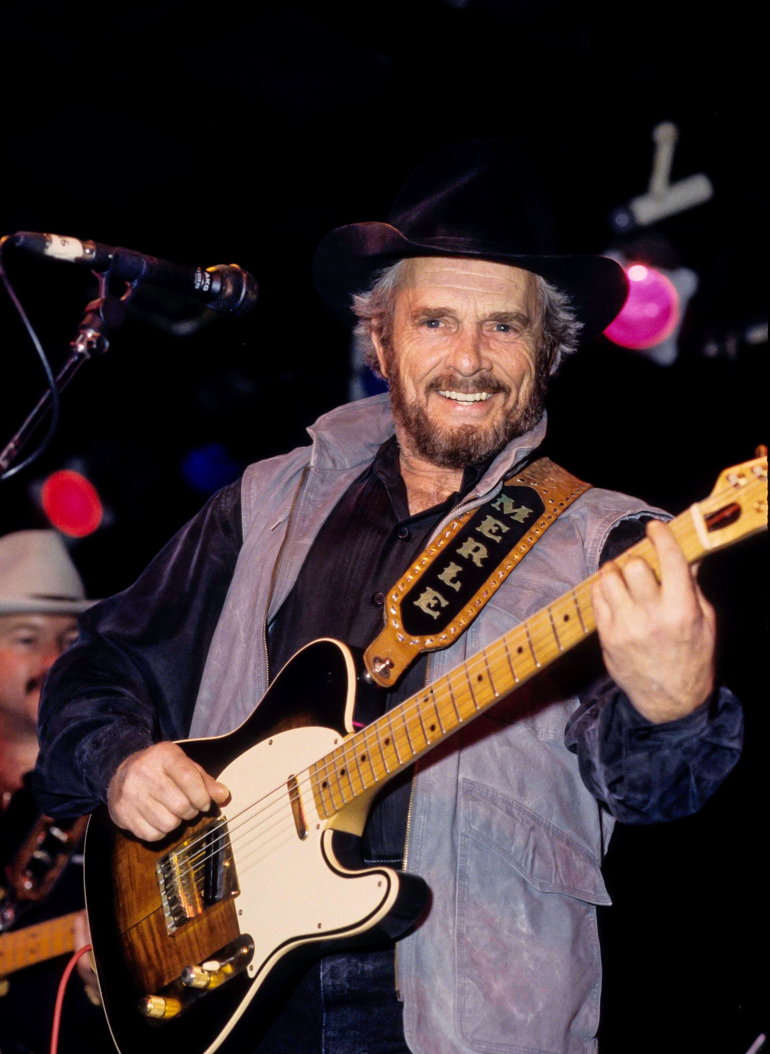 Merle Haggard leads his band The Strangers during a performance in New York City on June 23, 1993. 