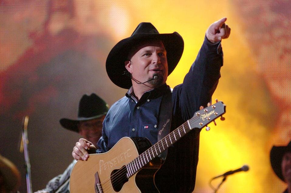 Garth Brooks performs in Times Square in New York City during the 39th Annual CMA Awards. 